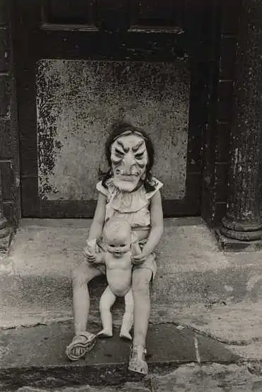masked-child-with-a-doll-n-y-c-1961.jpg